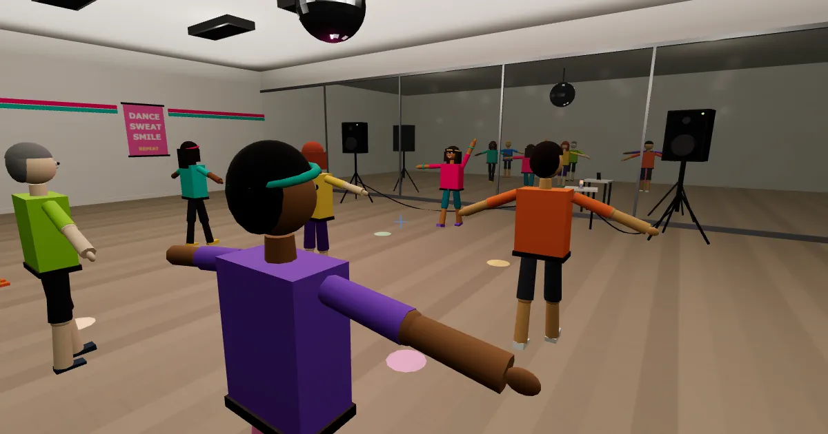 Roqui's 3D Zumba class mid-song: lights down, disco ball spinning, the class dancing in front of the mirror wall.